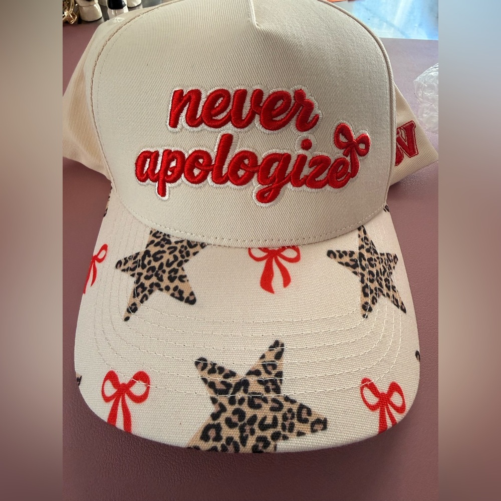 Never Apologize Embroidered Cream Baseball Cap with Red Script